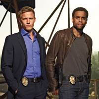 Warren Kole as Wes, Michael Ealy as Travis Warren Kole as Wes, Michael Ealy as Travis